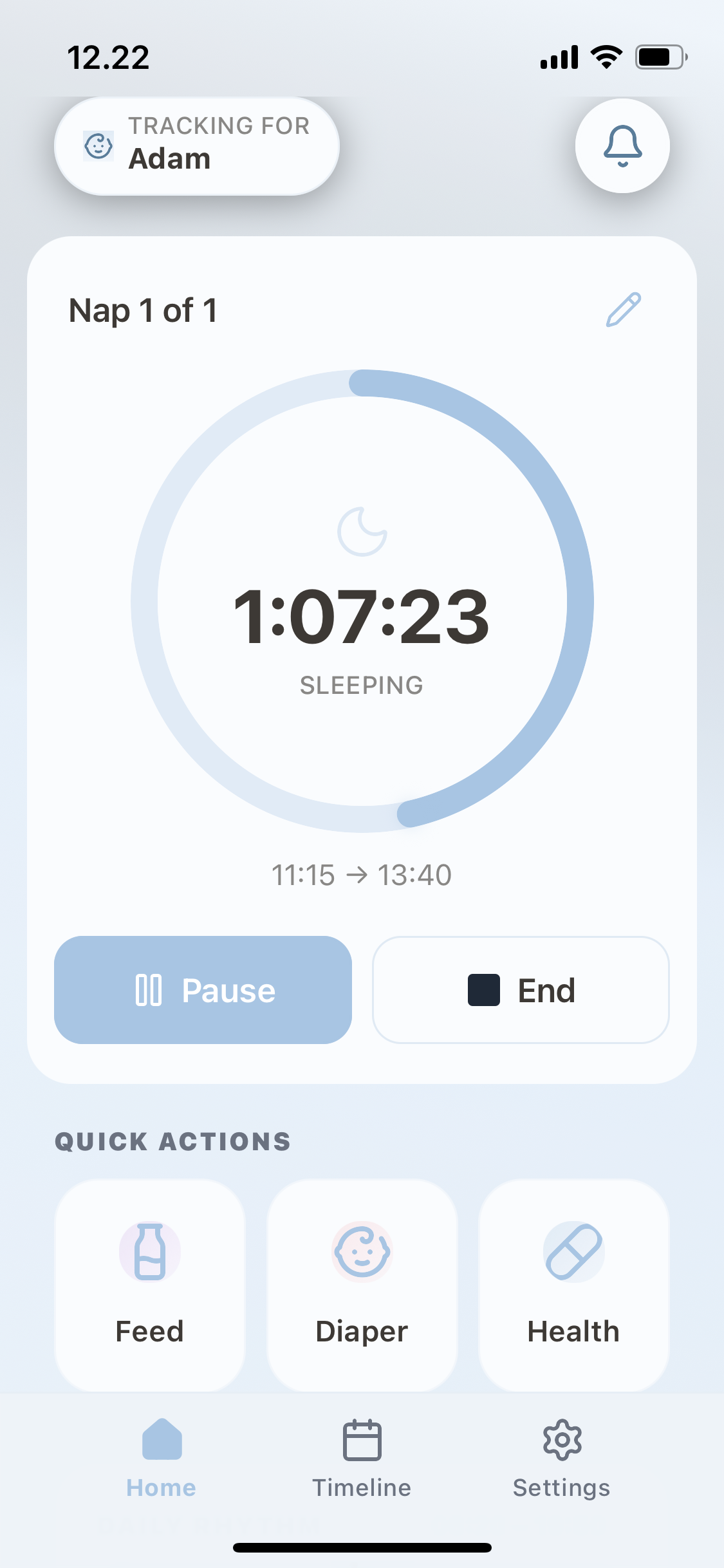 A nap in progress: a running timer with Pause and End buttons, and quick buttons for feeds, nappies and health
